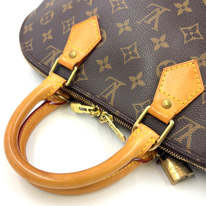 LOUIS VUITTON Alma PM monogram Handbag